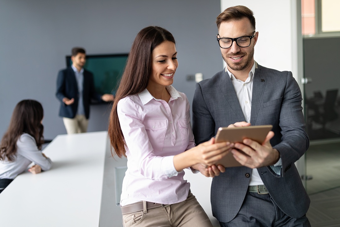 business people having fun and chatting at workplace office